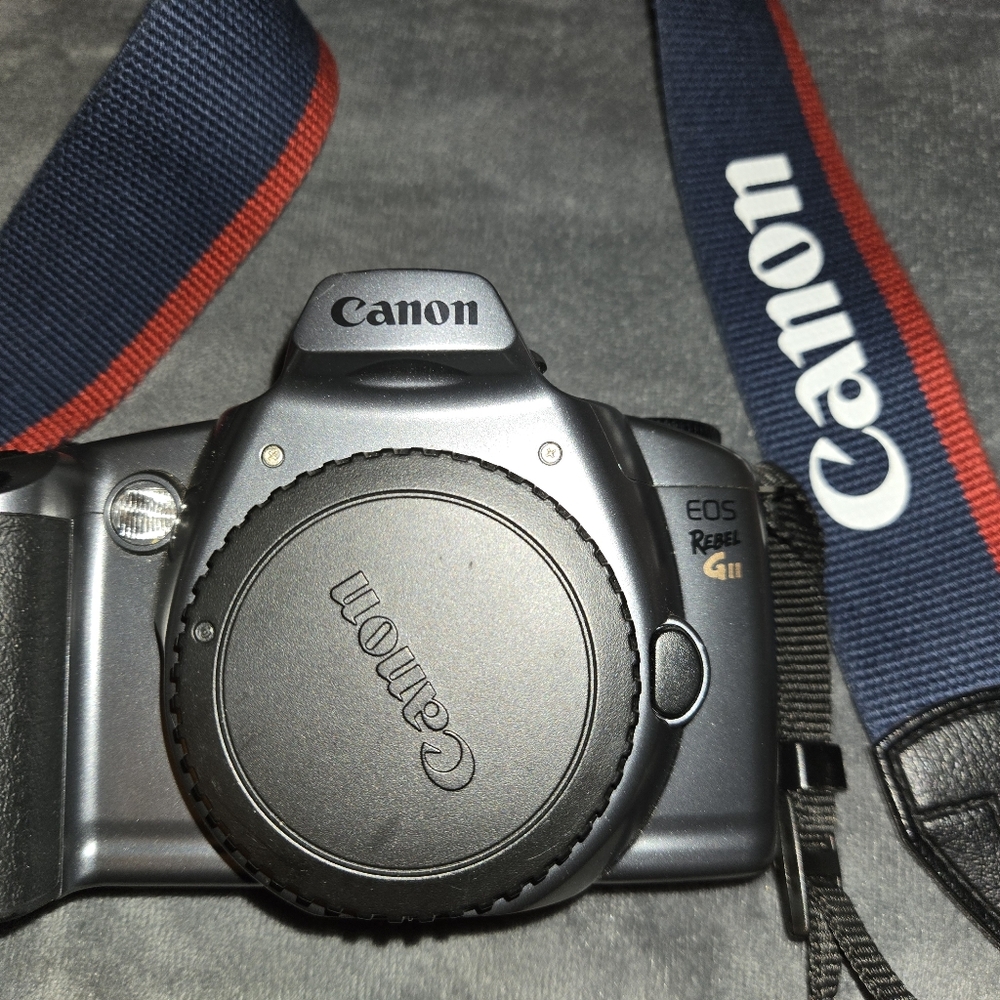 Used Canon EOS Rebel GII (film) With Camera Case. Last Picture Is Taken With It.